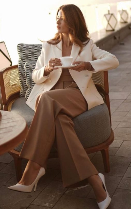 Professional working women setting on chair